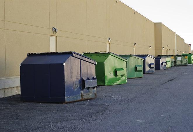 porta-potties placed alongside a construction site in Aurora